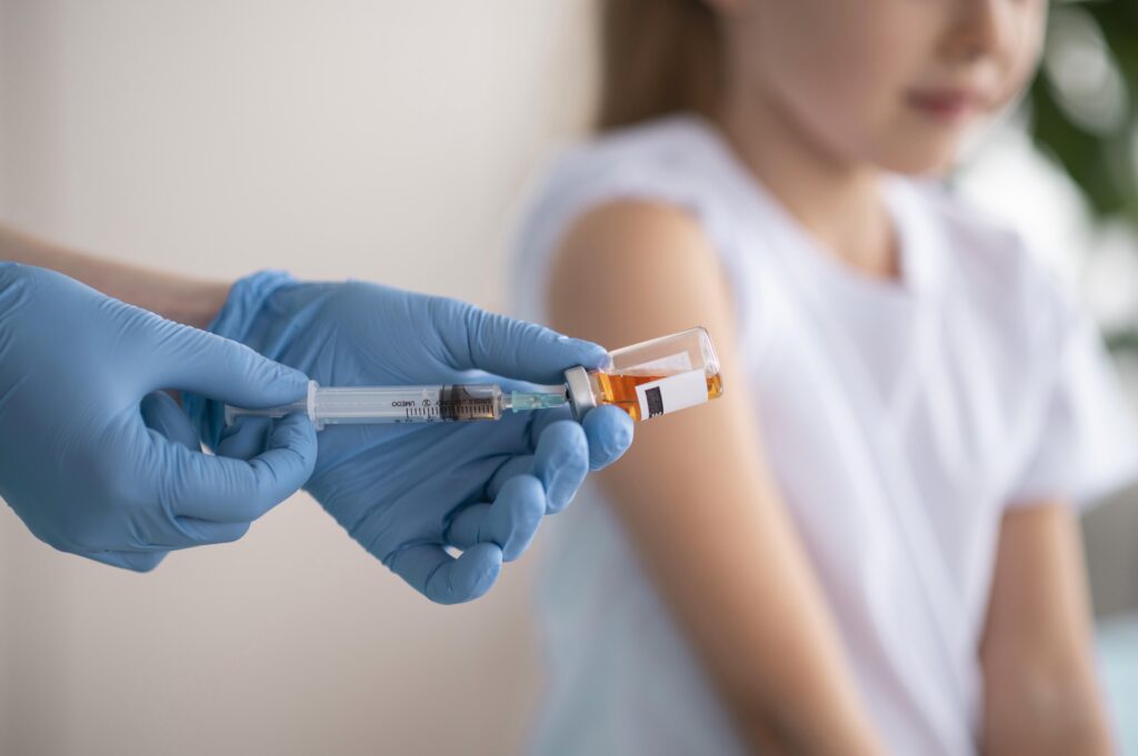 little-girl-vaccinating-coronavirus-hospital